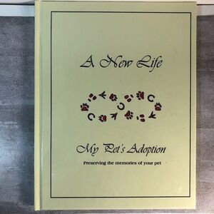 A New Life: My Pet's Adoption - Preserving the memories of your pet".Hardcover